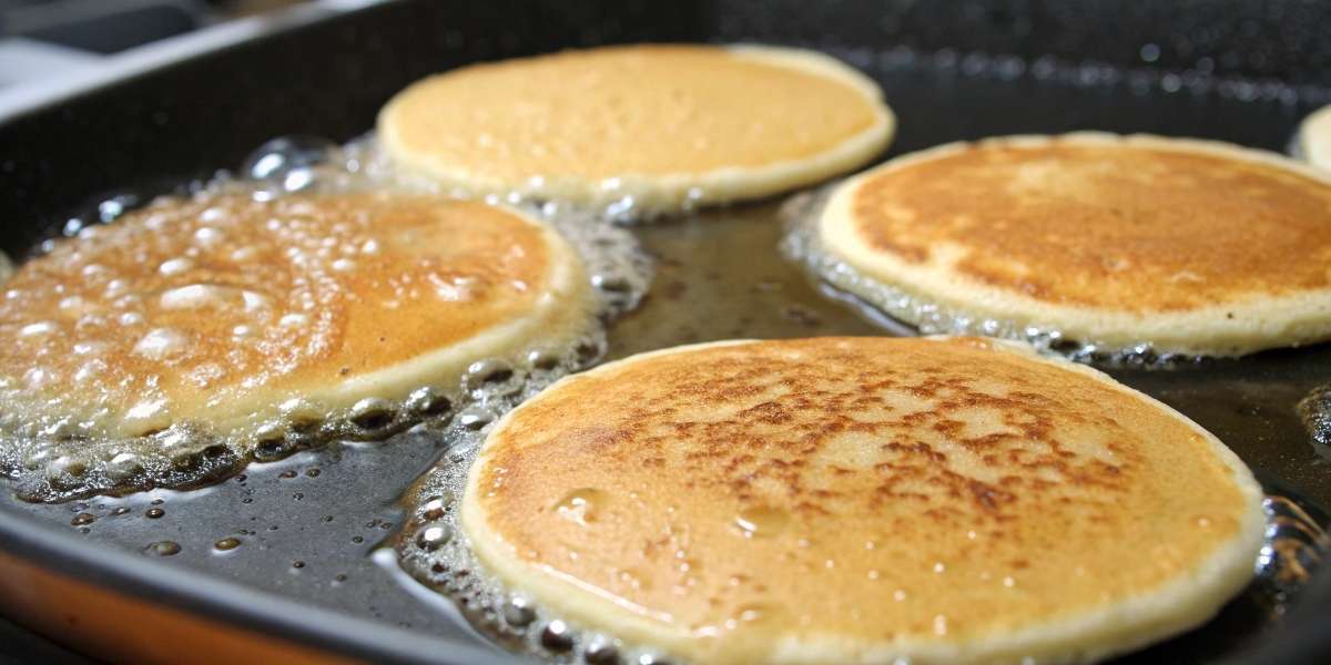 Pancakes without eggs cooking on a pan